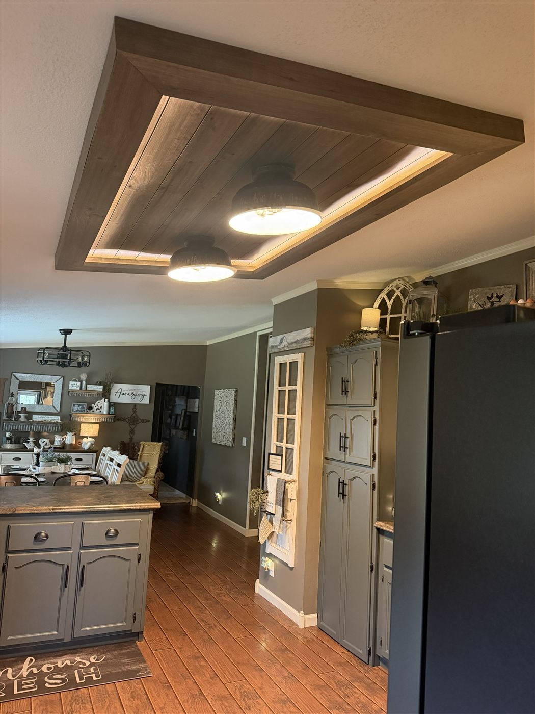 Finished floating shiplap ceiling feature with LED cove lighting