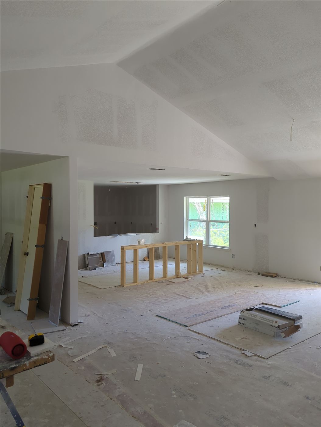 Kitchen and great room reframed down to the studs